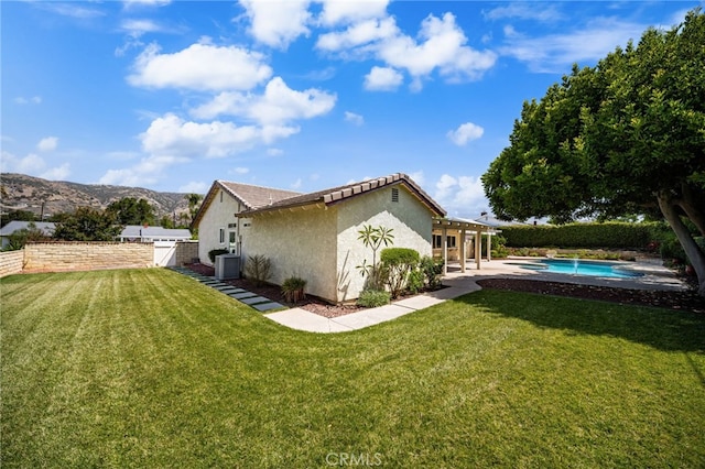 1128 Aldersgate Dr, La Verne, CA 91750 - back of property with a patio, stucco siding, a fenced backyard, a mountain view, and a tiled roof