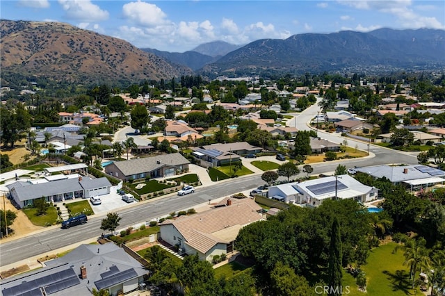 1128 Aldersgate Dr, La Verne, CA 91750 - aerial overview of property's location with nearby suburban area and a mountainous background