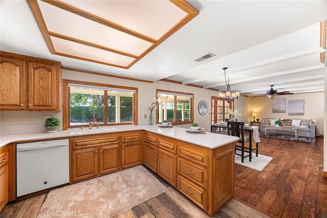1128 Aldersgate Dr, La Verne, CA 91750 - kitchen with dishwasher, wood finished floors, brown cabinets, and light countertops