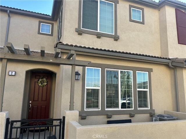 15958 Lasselle St Unit 2, Moreno Valley, CA 92551 - view of exterior entry with stucco siding