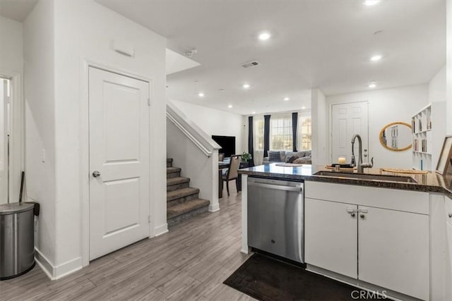 15958 Lasselle St Unit 2, Moreno Valley, CA 92551 - kitchen with dishwasher, light wood finished floors, white cabinetry, recessed lighting, and a peninsula
