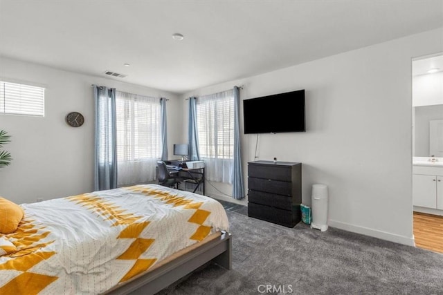 15958 Lasselle St Unit 2, Moreno Valley, CA 92551 - carpeted bedroom with baseboards and connected bathroom