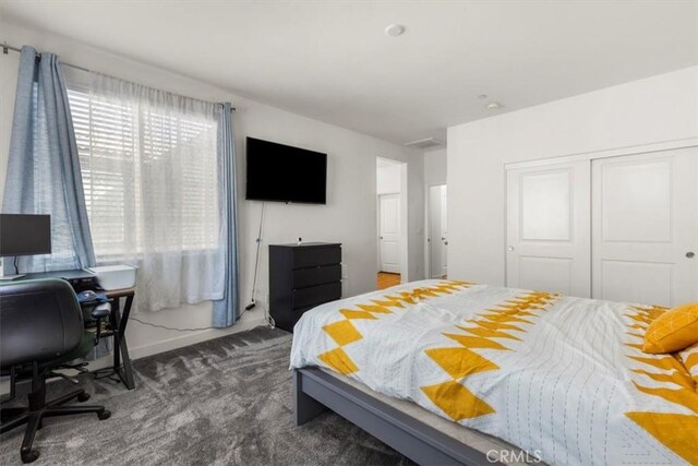 15958 Lasselle St Unit 2, Moreno Valley, CA 92551 - bedroom featuring a closet, carpet, and a desk