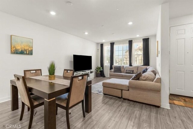15958 Lasselle St Unit 2, Moreno Valley, CA 92551 - dining space featuring light wood-style floors and recessed lighting