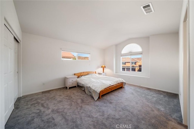 15453 La Casa Dr, Moreno Valley, CA 92555 - bedroom featuring vaulted ceiling, multiple windows, carpet, and a closet