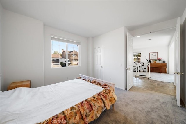 15453 La Casa Dr, Moreno Valley, CA 92555 - carpeted bedroom with multiple windows, an office area, and recessed lighting
