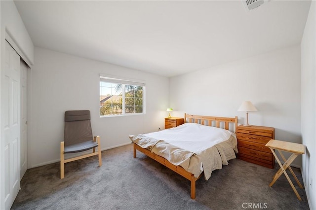 15453 La Casa Dr, Moreno Valley, CA 92555 - carpeted bedroom featuring a closet and baseboards