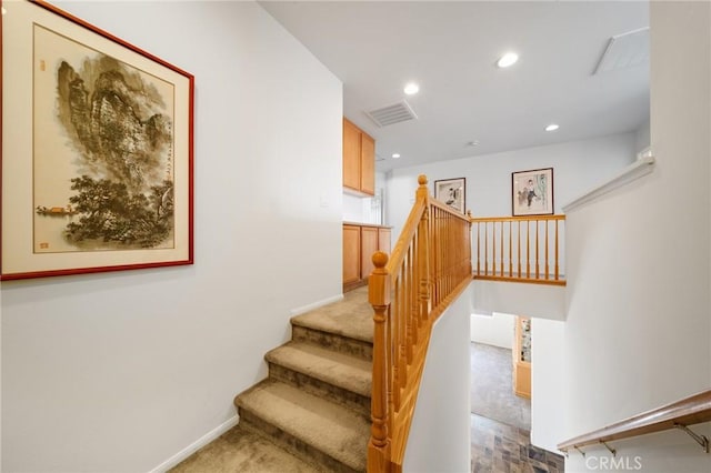 15453 La Casa Dr, Moreno Valley, CA 92555 - staircase with recessed lighting and baseboards