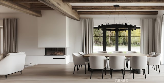 1901 Mariners Dr, Newport Beach, CA 92660 - dining space featuring beamed ceiling, a fireplace, healthy amount of natural light, and wood finished floors