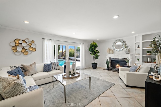 9168 El Azul Cir, Fountain Valley, CA 92708 - living area featuring french doors, light tile patterned floors, a fireplace, crown molding, and recessed lighting
