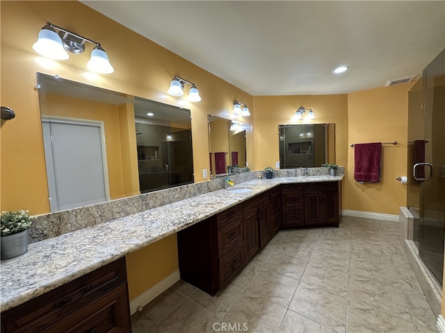 330 W California Blvd Unit 101, Pasadena, CA 91105 - full bath featuring double vanity, a shower stall, and recessed lighting