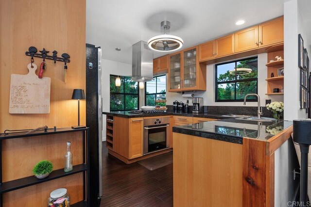860 Nardo Rd, Encinitas, CA 92024 - kitchen featuring oven, island exhaust hood, a peninsula, tile countertops, and open shelves