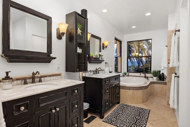 860 Nardo Rd, Encinitas, CA 92024 - full bathroom featuring a bath, two vanities, recessed lighting, and tile patterned flooring