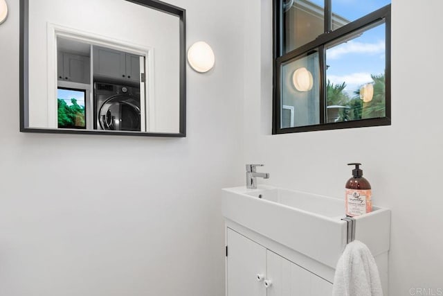 860 Nardo Rd, Encinitas, CA 92024 - bathroom with washer / dryer and vanity