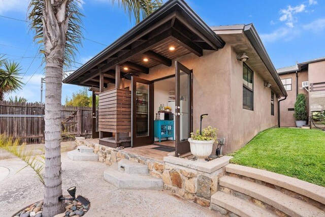 860 Nardo Rd, Encinitas, CA 92024 - doorway to property featuring stucco siding