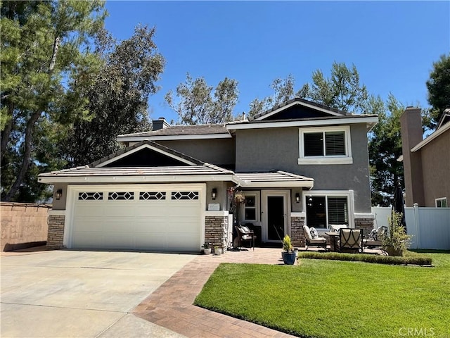33037 Paterno St, Temecula, CA 92592 - view of front of home with stucco siding, concrete driveway, and a garage