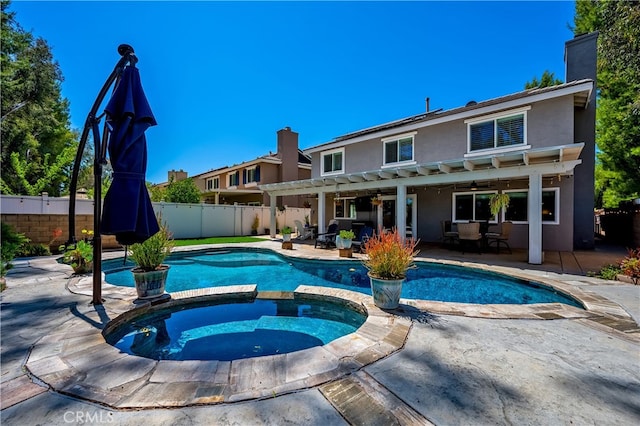 33037 Paterno St, Temecula, CA 92592 - view of swimming pool with a pergola, a pool with connected hot tub, a fenced backyard, a patio area, and outdoor dining area