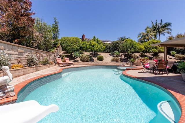 31032 Via Estenaga, San Juan Capistrano, CA 92675 - view of pool featuring a patio area, a water slide, and a pool with connected hot tub