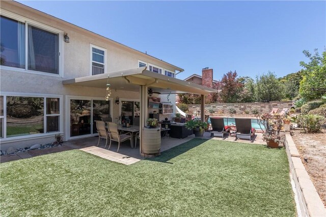 31032 Via Estenaga, San Juan Capistrano, CA 92675 - view of yard with a patio area, a ceiling fan, and an outdoor living space