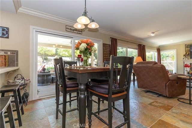 31032 Via Estenaga, San Juan Capistrano, CA 92675 - dining area featuring crown molding and stone tile floors