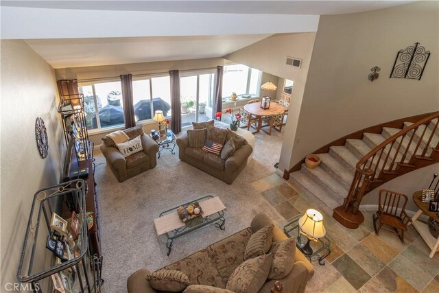 31032 Via Estenaga, San Juan Capistrano, CA 92675 - living area featuring lofted ceiling, stairway, and carpet flooring