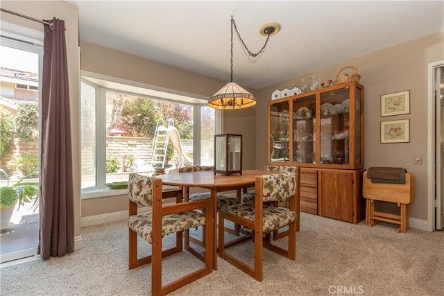 31032 Via Estenaga, San Juan Capistrano, CA 92675 - dining room featuring light colored carpet and a chandelier