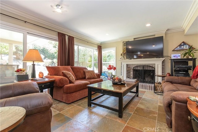 31032 Via Estenaga, San Juan Capistrano, CA 92675 - living room with crown molding, a fireplace, stone tile flooring, and recessed lighting