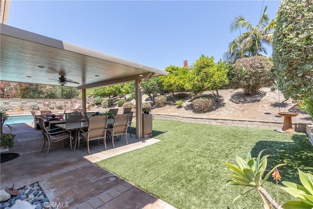 31032 Via Estenaga, San Juan Capistrano, CA 92675 - view of grassy yard with ceiling fan, a patio, and outdoor dining area
