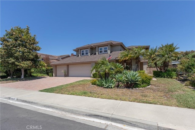 31032 Via Estenaga, San Juan Capistrano, CA 92675 - view of front of home featuring decorative driveway and an attached garage