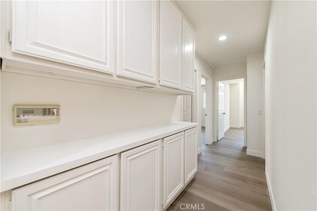 3314 Braemar Ln, Corona, CA 92882 - corridor with light wood finished floors and recessed lighting