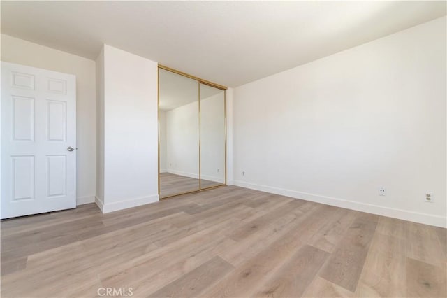 3314 Braemar Ln, Corona, CA 92882 - unfurnished bedroom with light wood-type flooring and a closet