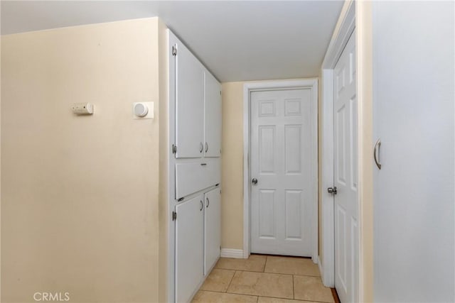 28851 Murrieta Rd, Menifee, CA 92586 - hallway featuring light tile patterned flooring and baseboards
