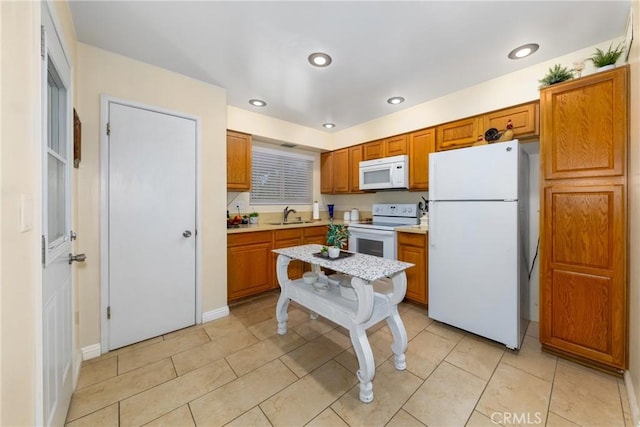 28851 Murrieta Rd, Menifee, CA 92586 - kitchen featuring white appliances, light countertops, brown cabinetry, recessed lighting, and light tile patterned floors