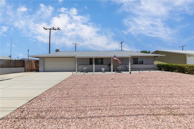 28851 Murrieta Rd, Menifee, CA 92586 - ranch-style home featuring concrete driveway and an attached garage