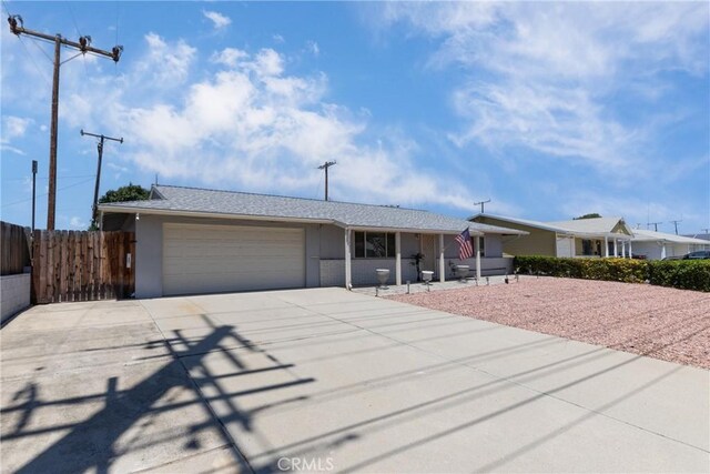28851 Murrieta Rd, Menifee, CA 92586 - ranch-style home featuring a garage and concrete driveway