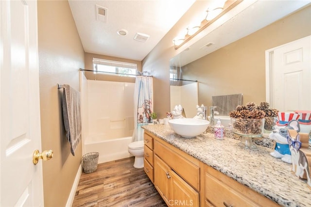 29155 Celestial Dr, Menifee, CA 92584 - bathroom featuring vanity, wood finished floors, and shower / bath combo