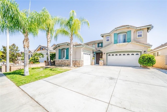 29155 Celestial Dr, Menifee, CA 92584 - view of front of house featuring stucco siding, concrete driveway, a garage, and stone siding