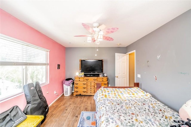 29155 Celestial Dr, Menifee, CA 92584 - bedroom featuring light wood-style floors and a ceiling fan