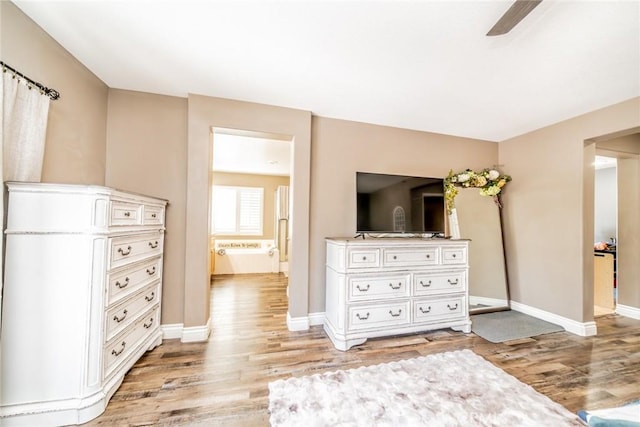 29155 Celestial Dr, Menifee, CA 92584 - bedroom with light wood-type flooring and ceiling fan