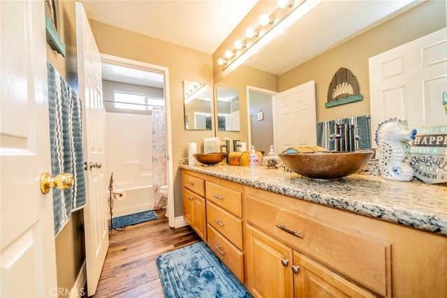29155 Celestial Dr, Menifee, CA 92584 - bathroom with vanity, wood finished floors, and shower / tub combo with curtain