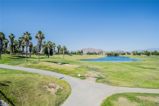29155 Celestial Dr, Menifee, CA 92584 - view of community with a water and mountain view, a yard, and golf course view
