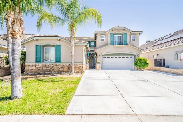 29155 Celestial Dr, Menifee, CA 92584 - mediterranean / spanish house with an attached garage, concrete driveway, stucco siding, and stone siding