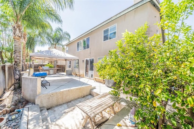 29155 Celestial Dr, Menifee, CA 92584 - rear view of property with a gazebo, a patio area, a fenced backyard, and stucco siding