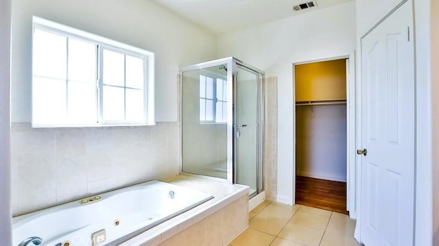 15537 Pheasant St, Chino Hills, CA 91709 - full bath with a shower stall, tile patterned flooring, a whirlpool tub, and a spacious closet