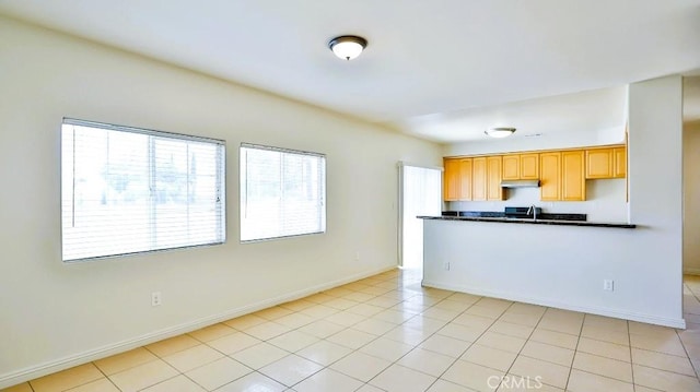 15537 Pheasant St, Chino Hills, CA 91709 - kitchen with under cabinet range hood and dark countertops