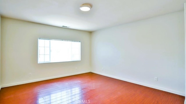 15537 Pheasant St, Chino Hills, CA 91709 - empty room featuring wood finished floors and baseboards