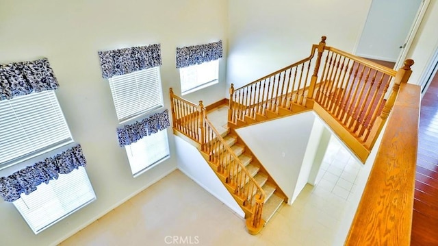 15537 Pheasant St, Chino Hills, CA 91709 - stairs featuring a high ceiling and baseboards