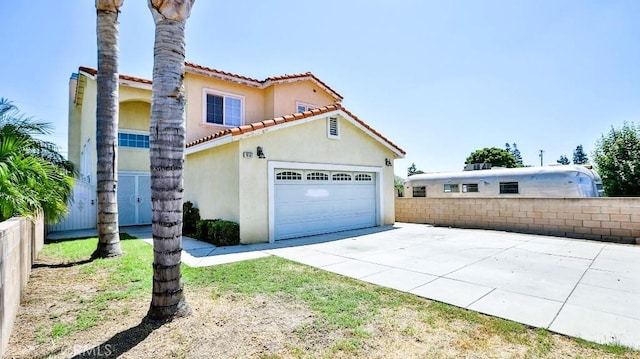 15537 Pheasant St, Chino Hills, CA 91709 - view of front of house with stucco siding, a tile roof, concrete driveway, and an attached garage