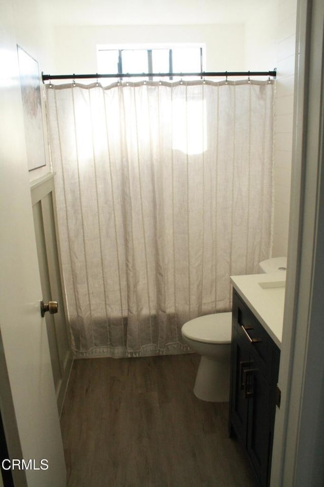 5246 Longfellow Way, Oxnard, CA 93033 - full bathroom with vanity, wood finished floors, and shower / bathtub combination with curtain