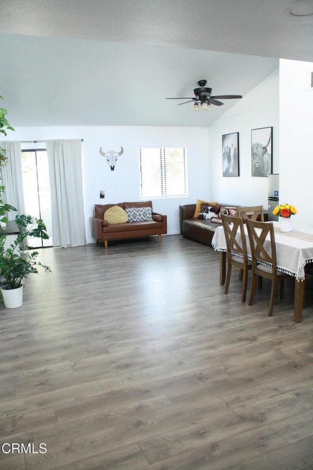 5246 Longfellow Way, Oxnard, CA 93033 - dining room featuring healthy amount of natural light, vaulted ceiling, wood finished floors, and ceiling fan